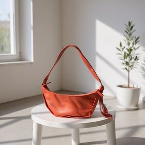 Orange hobo bag